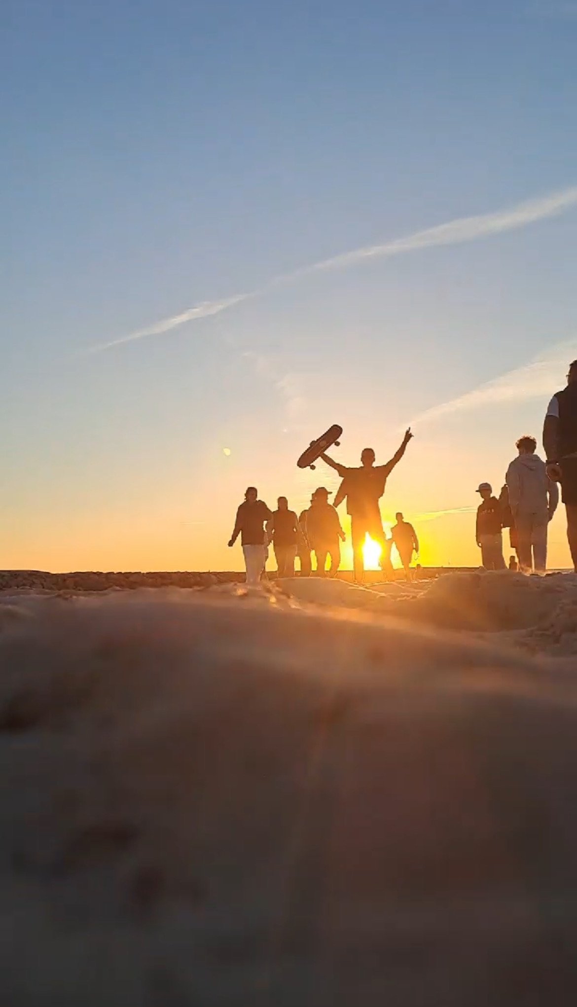 Friends at sunset on the coast