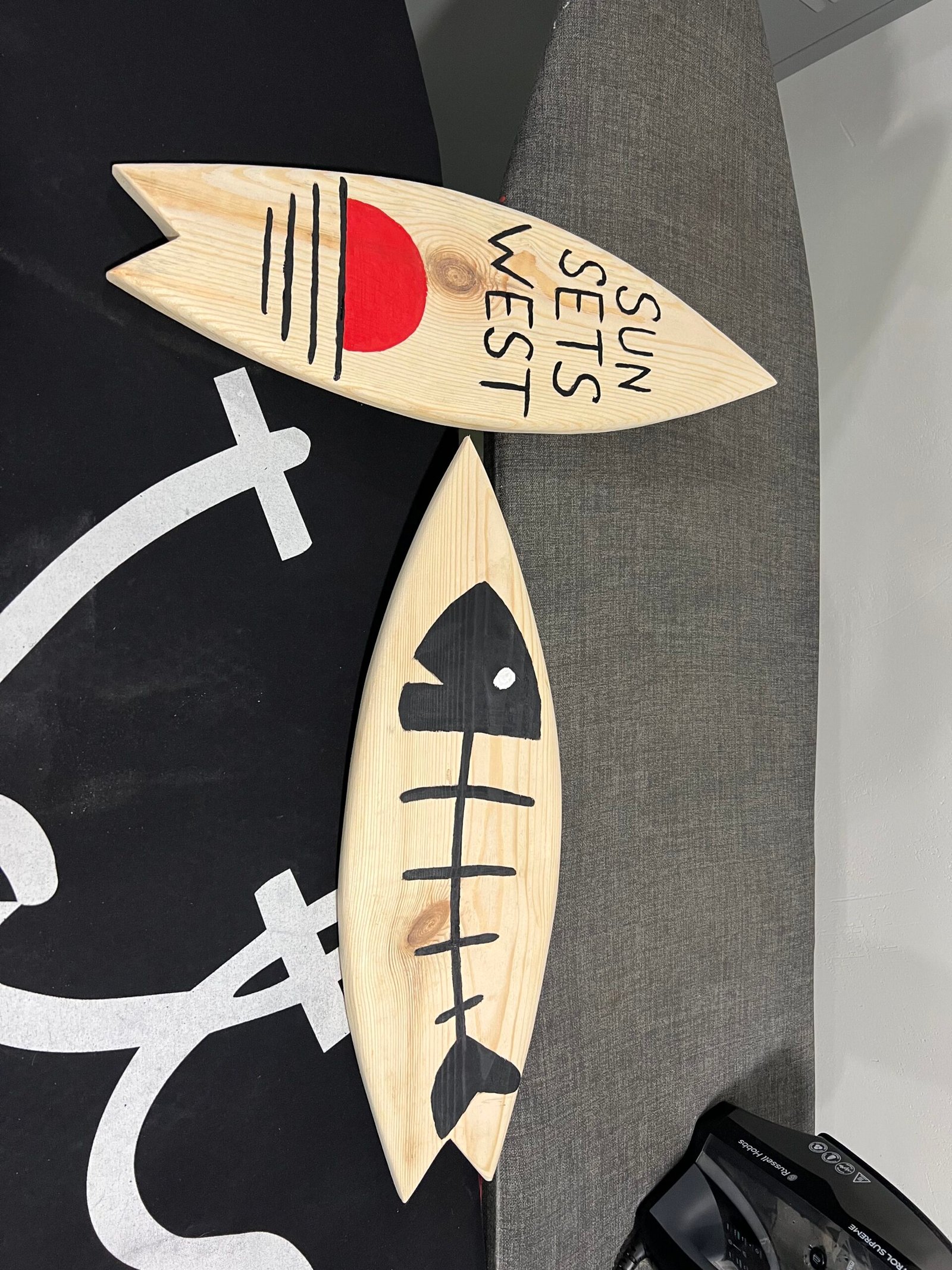 Hand-painted wooden surfboards